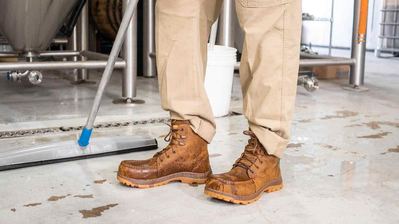 Lace up work boots. Before you get down to work, lace ‘em up.